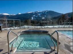 Mountain Escape: 2BR Family Friendly, Pool, Hot tub, 5 mins to Village!