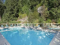 Spacious 1.5BR: Sleeps 4, Pool, Balcony, Private Hot Tub.